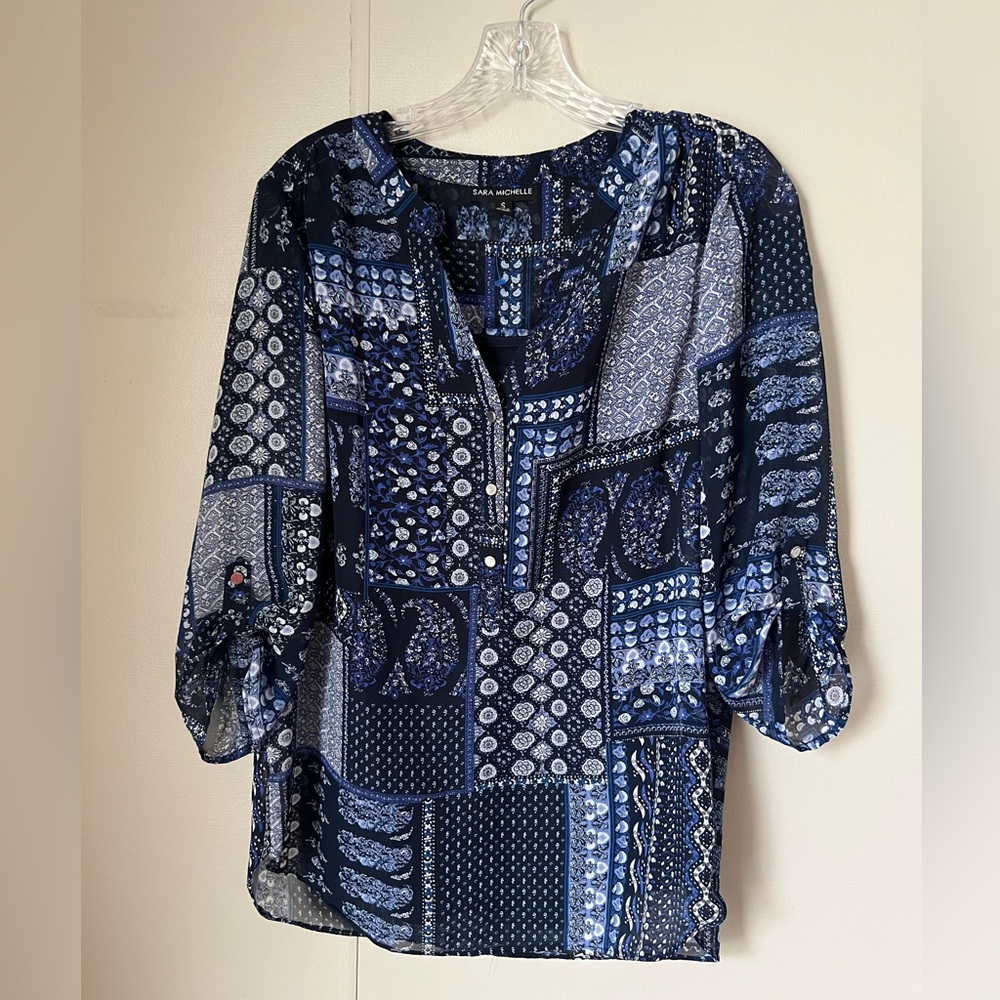 Sara Michelle flowy top
Size: S